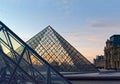 Louvre glass pyramid at sunset Royalty Free Stock Photo
